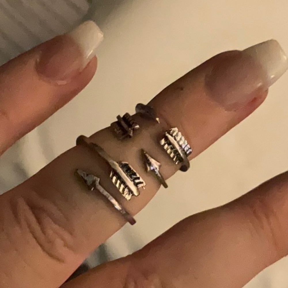 Three midi rings, silver tone